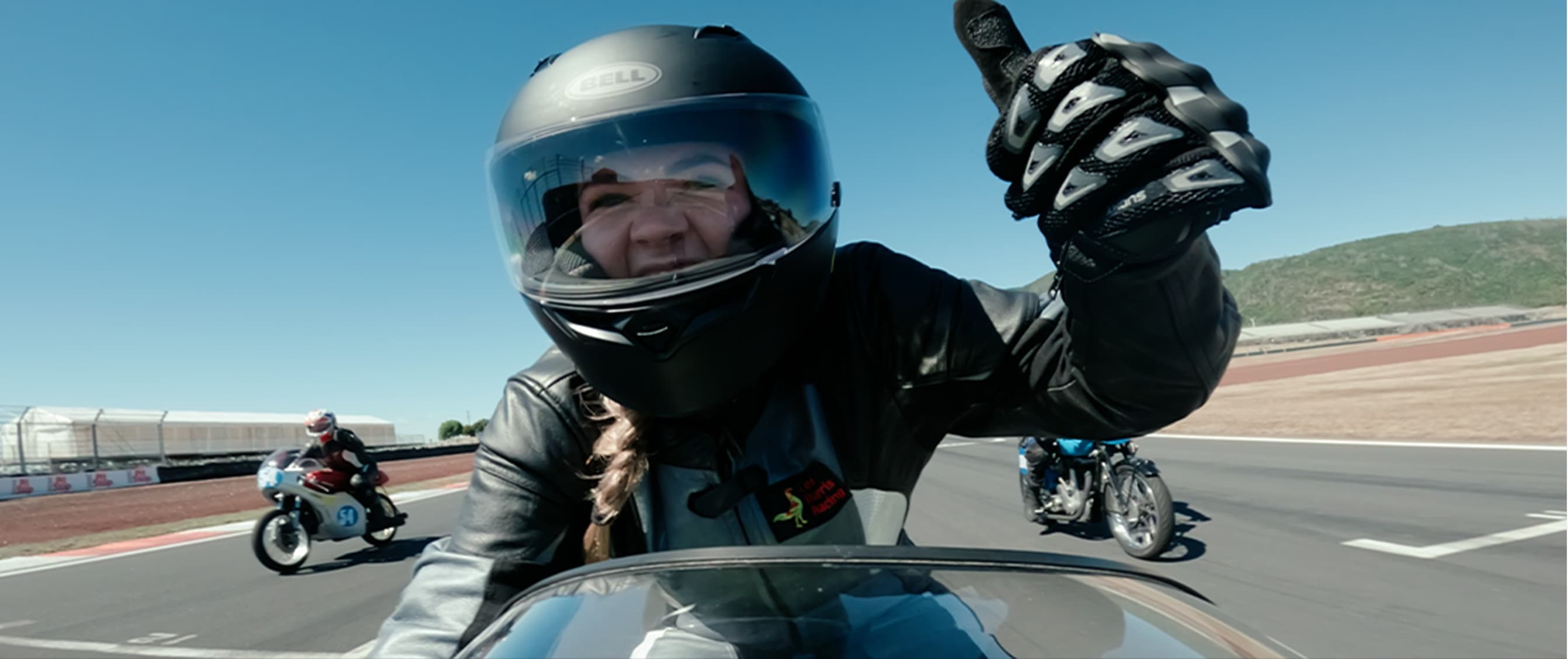 Rider giving a thumbs up mid-race, from Stage Two's documentary series Zero to 100