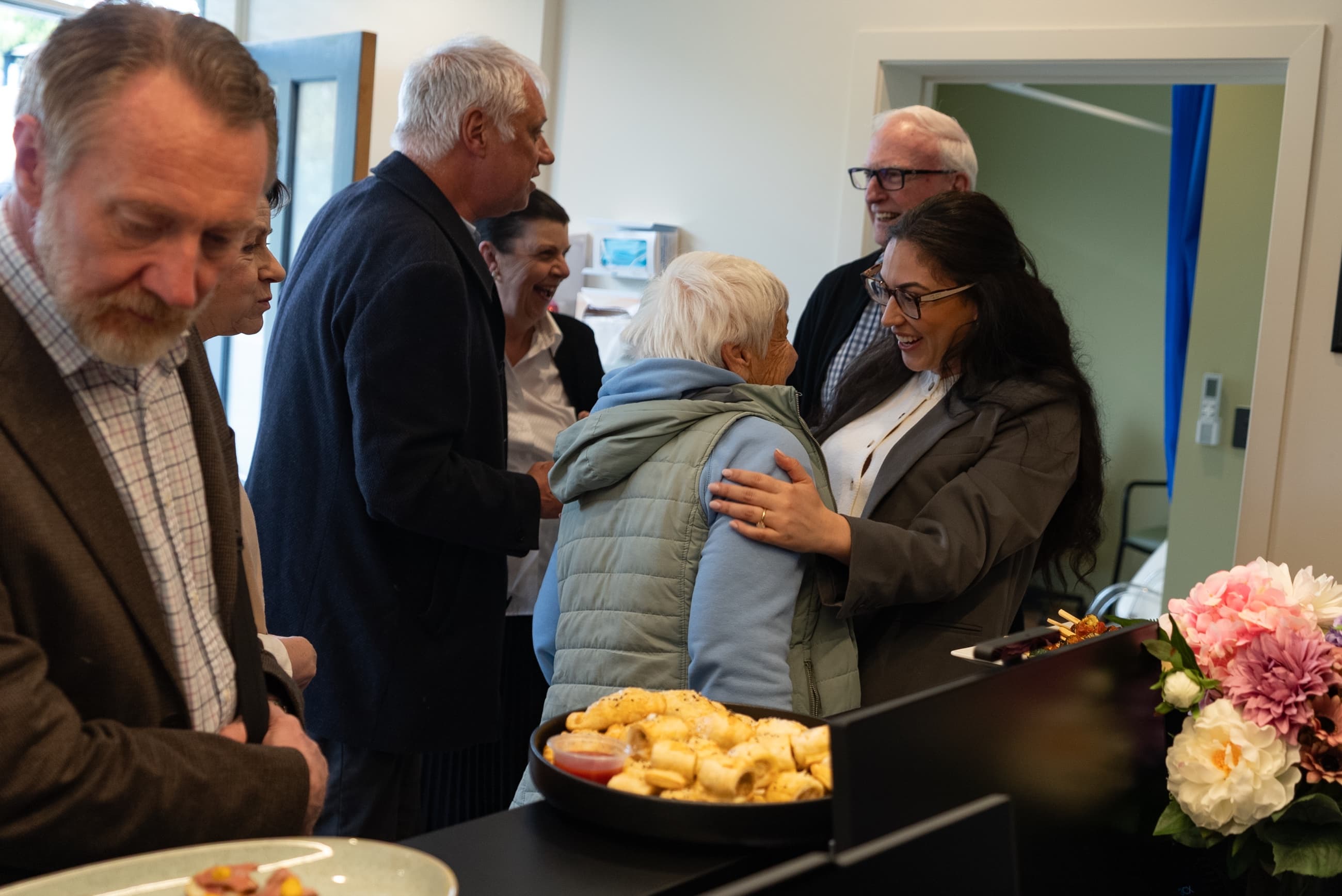 Guests mingling at the clinic's launch night