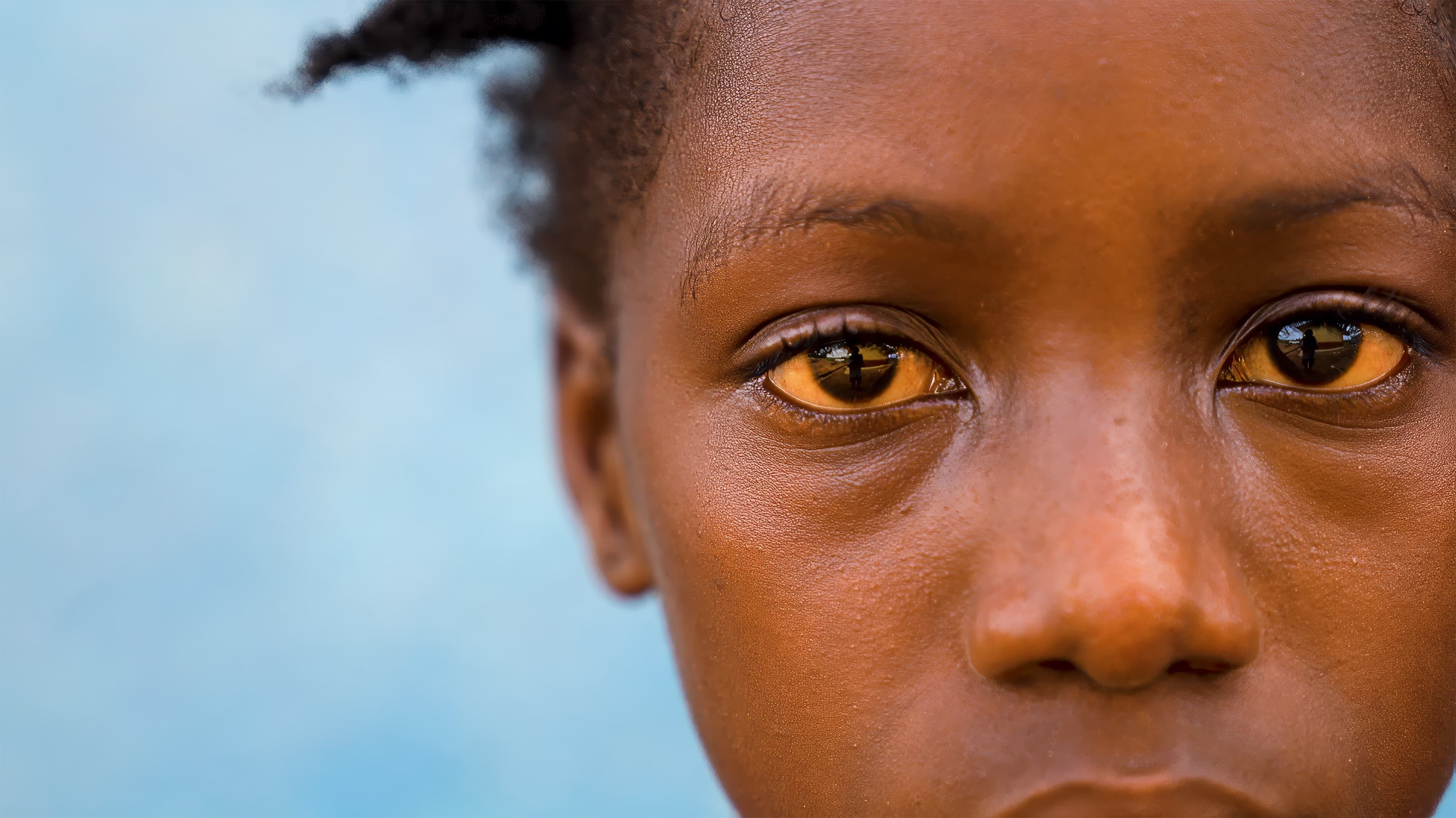 Close portrait of a child's eyes, Sierra Leone
