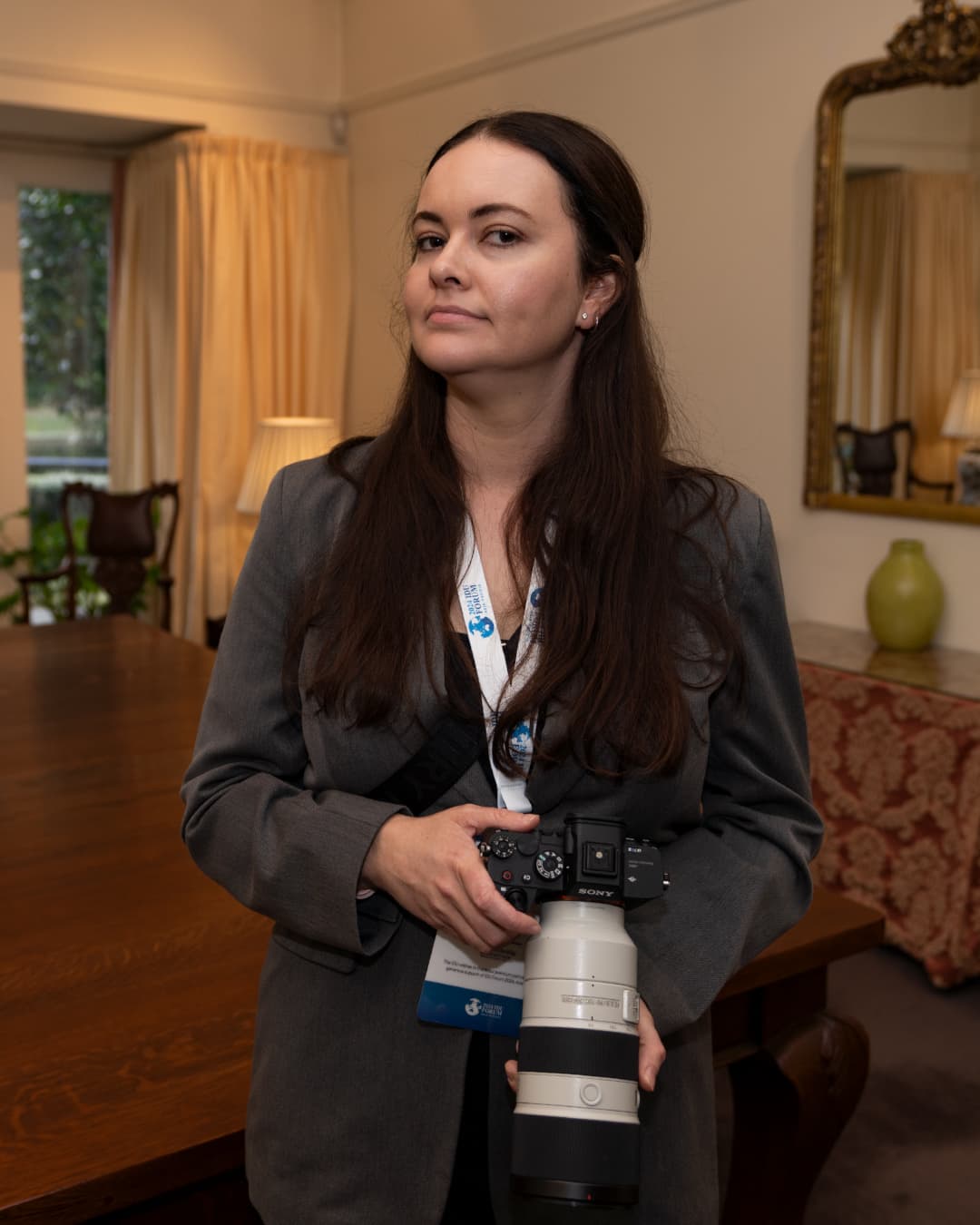 Ellie Harwood holding a camera