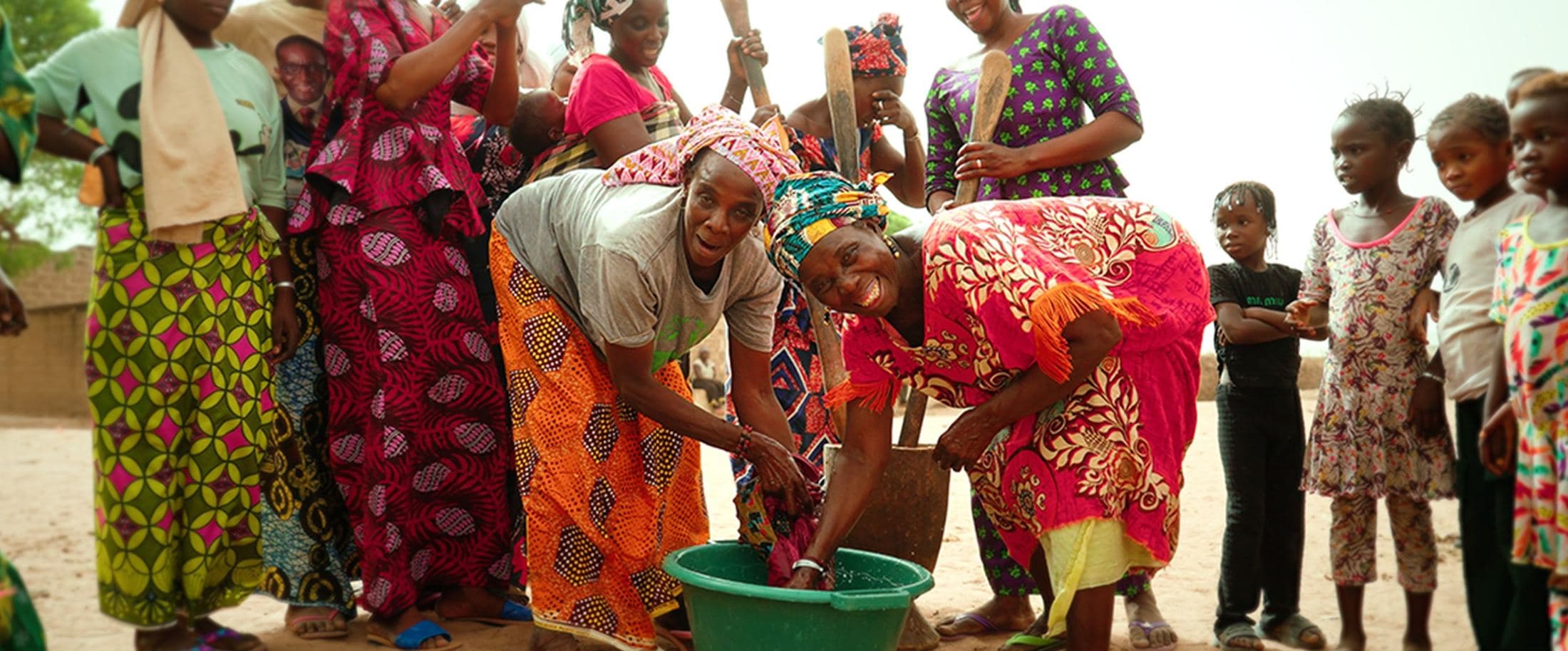 Women washing hands together, Senegal