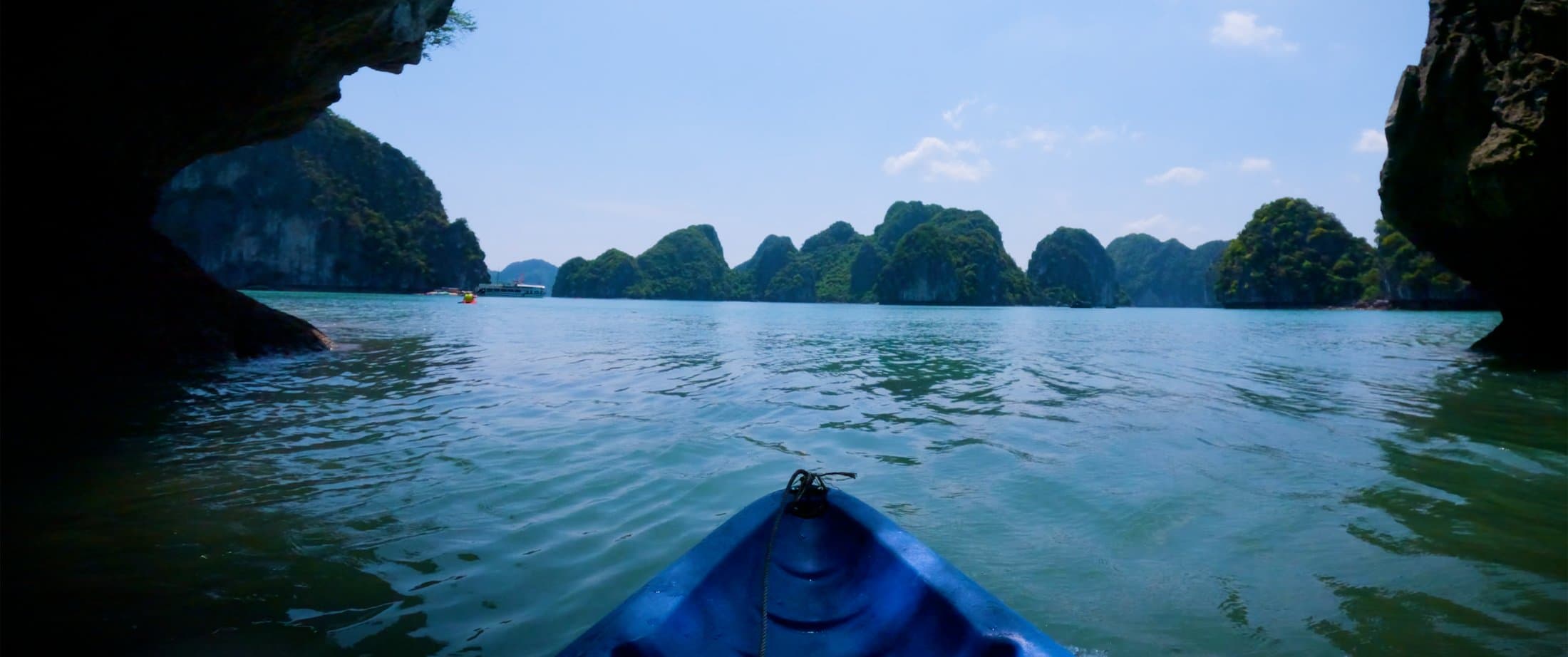 Kayaking through limestone karst formations, Vietnam