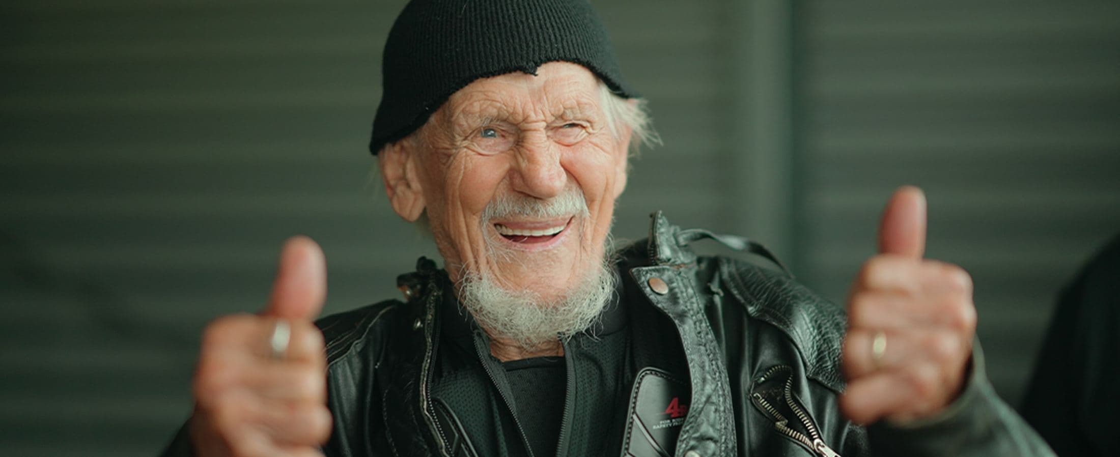 Veteran rider smiling, thumbs up