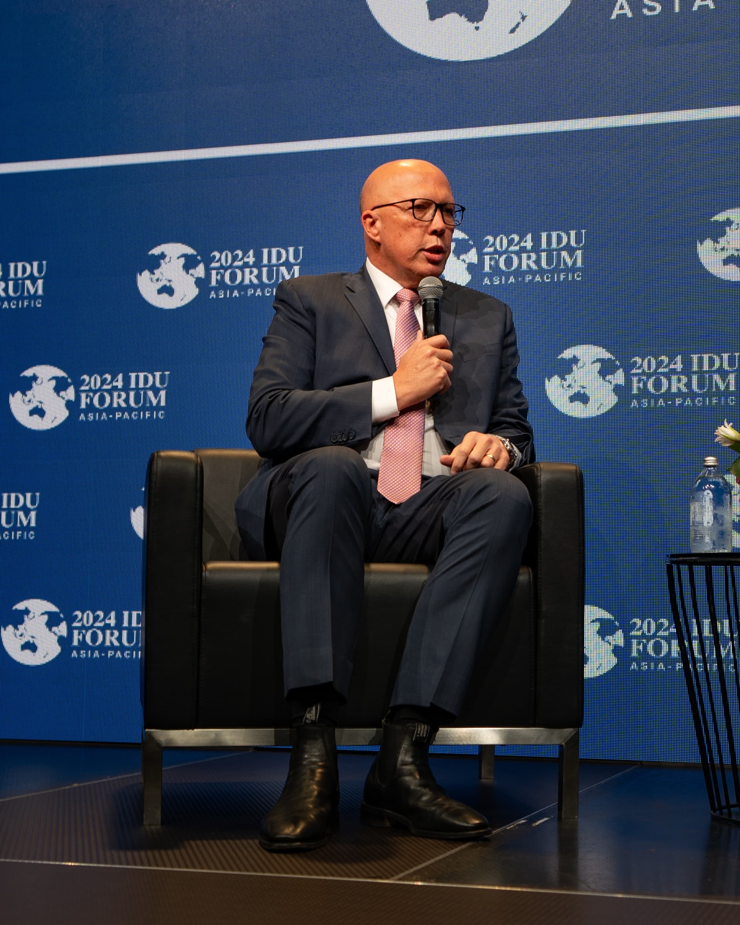 A panel discussion on the IDU Forum stage