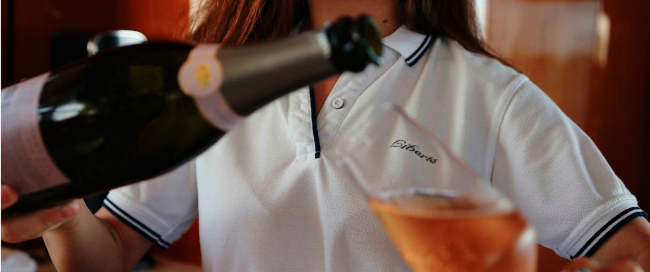 Champagne being poured on deck