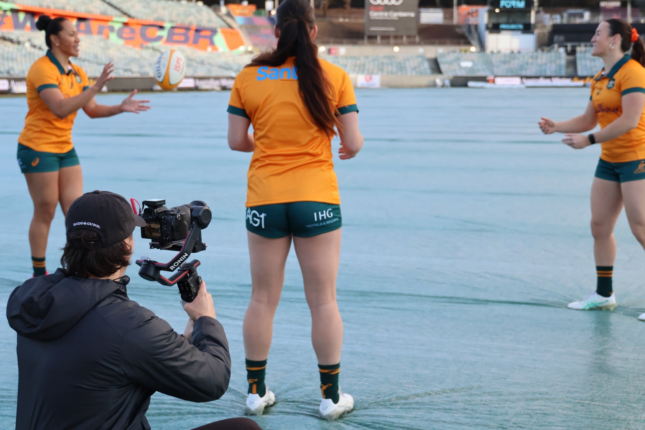 Stage Two crew filming pitchside with a gimbal rig